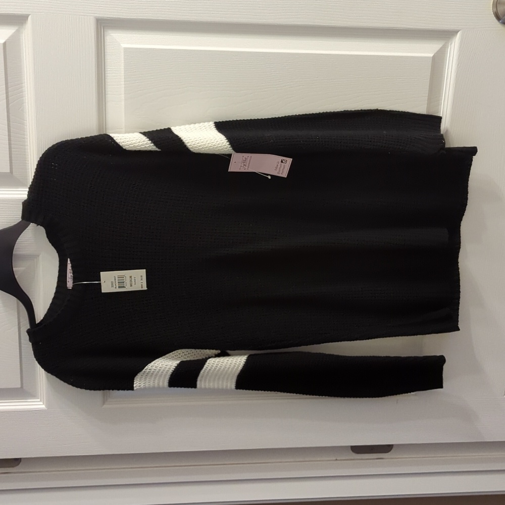Say What medium black and white sweater.